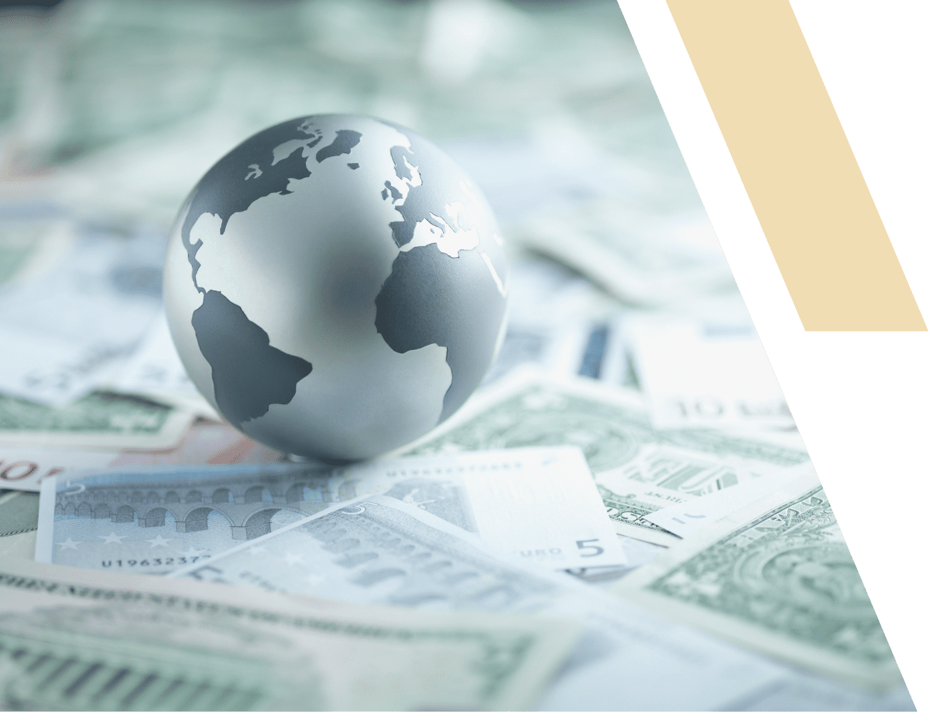 Globe on scattered currency notes